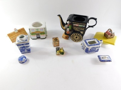 A group of Rington's Tea teapots, comprising a Rington's Tea and Coffee Bean tea merchant teapot, with gold signature P. Cardew, limited edition no. 3375/7500, 29cm high, a blue and white Maling Rington's Tea canister dated 1991, 14cm high, a Newcastle Up - 2