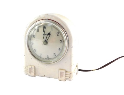 A Ferranti Art Deco electric mantel clock, later over painted in white, with Art Deco overall design, 15cm high, 12cm wide, 5cm deep. (AF) WARNING! This lot contains untested or unsafe electrical items. It is supplied for scrap or re-conditioning only. T