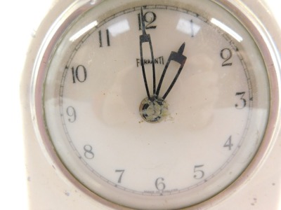 A Ferranti Art Deco electric mantel clock, later over painted in white, with Art Deco overall design, 15cm high, 12cm wide, 5cm deep. (AF) WARNING! This lot contains untested or unsafe electrical items. It is supplied for scrap or re-conditioning only. T - 2