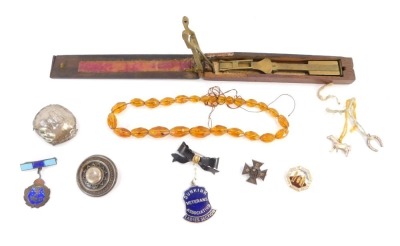 A small group of jewellery, silver and effects, a set of half guinea postage scales in fitted case, a single rose gold part chain, a Deutsch 5 mark single earring, a Victorian silver brooch, enamel pins, silver scent bottle top, imitation amber beads, etc