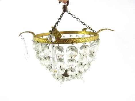 A gilt and crystal bag chandelier, with circular leaf cast frame supporting brilliant and tear shaped drops, 21cm diameter, approx 15cm drop.