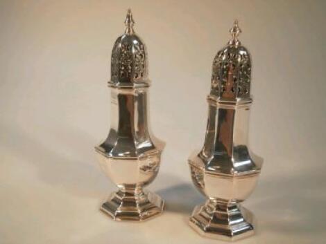 A matched pair of Edwardian silver sugar shakers