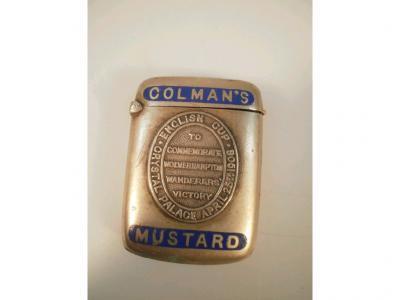 A Colman's Mustard advertising vesta with commemorative plaque to commemorate