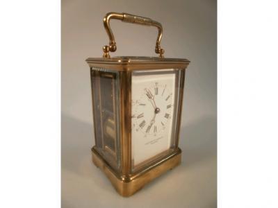 A brass cased carriage clock