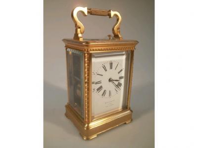 A gilt brass French repeater carriage clock