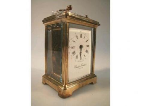 A Charles Frodsham brass carriage timepiece