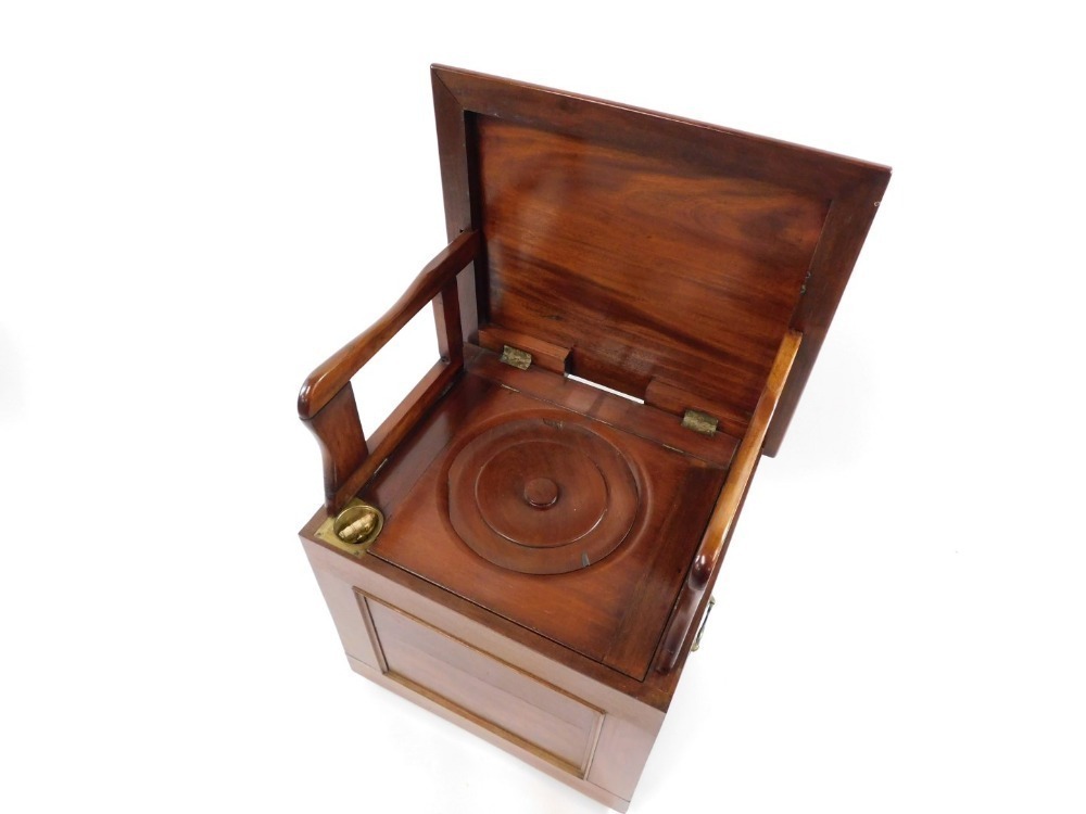 A Victorian mahogany box commode, the hinged top opening to reveal a ...