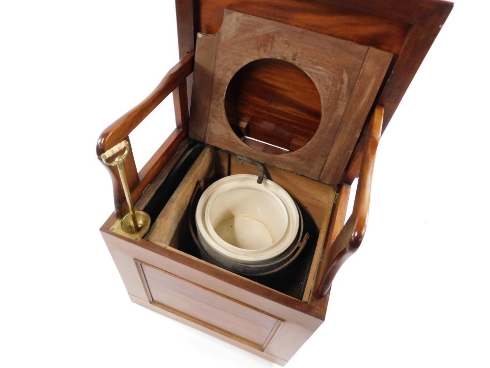 A Victorian mahogany box commode, the hinged top opening to reveal a ...