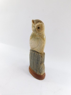 A carved horn figure of an owl on a perch, on wooden base, 26cm high. - 3