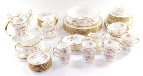 A Paragon china Victoriana Rose pattern part dinner tea and coffee service, comprising sauce boat on stand, salad bowl, eight dinner, five dessert and six side plates, seven soup cups and eight saucers, coffee pot, tea pot, cream jug, sugar bowl, pair of