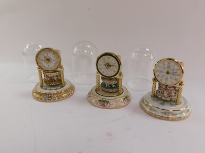 Three Arzberg porzellan anniversary clocks for Franklin Mint, comprising Grand Carousel Anniversary, another similar, and Spirit of America, 17cm high, each boxed. - 5