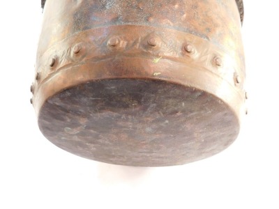 A hammered copper log bucket, with studded strap work, 30cm high, 50cm diameter. - 3