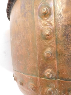 A hammered copper log bucket, with studded strap work, 30cm high, 50cm diameter. - 4