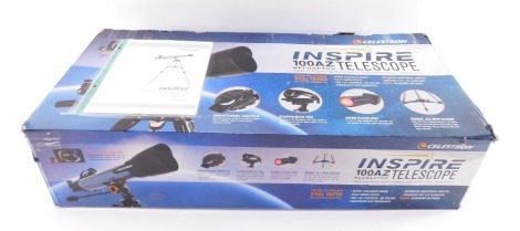 A Celestron Inspire 100AZ telescope, boxed.