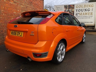 A 2006 Ford Focus ST-2 Sports 5-door Hatchback, registration WU56 OYJ, 2500cc in line five cylinder, c/w Ford Approved Mountune upgrade to 260bhp, ASBO orange with black roof, 132,911 recorded miles with full MOT (current to expire 6th January 2023) and s - 14