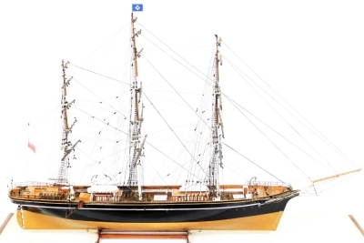 A wooden scale model of The Cutty Sark, three masted clipper complete with lifeboats, rigging, etc., wooden cased with brass plaque, the case 120cm wide. - 2