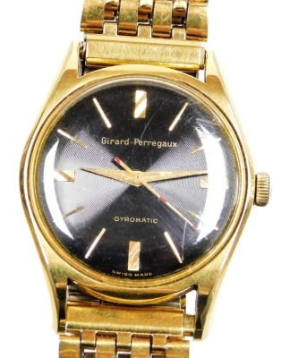 A Girard-Perregaux gold plated gentleman's Gyromatic wristwatch, the 3.5cm black dial with baton numerals, centre seconds, on a gold plated bracelet strap.