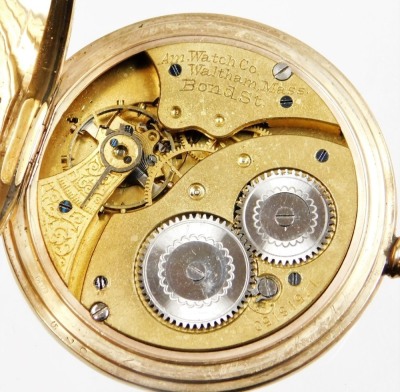 A gentleman's 9ct gold half hunter cased pocket watch, for Walthams, USA, keyless wind, with a white enamel dial bearing Roman numerals and subsidiary seconds dial, internal dust cover presentation engraved, American Watch Company, Waltham Mass, Bond Stre - 4