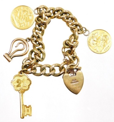 A 9ct gold curb link charm bracelet, with two charms and two half sovereigns, Queen Victoria 1900 and Edward VII 1910, on a hearth shaped padlock clasp, with safety chain as fitted, 58.7g all in.