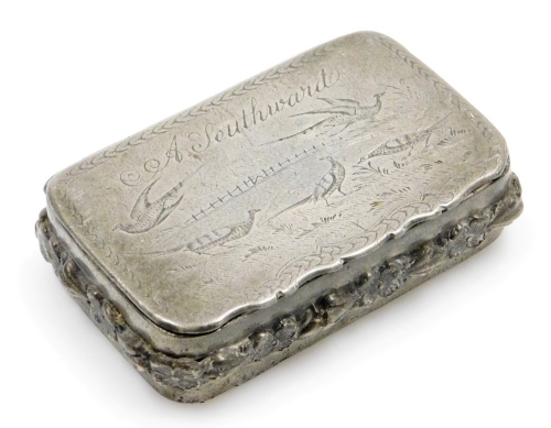 A 19thC pewter snuff box, the hinged lid inscribed A Southward, above a scene of pheasants within a foliate border, with a raised border of flower heads and foliage, scroll engraved base, 8cm x 5cm.