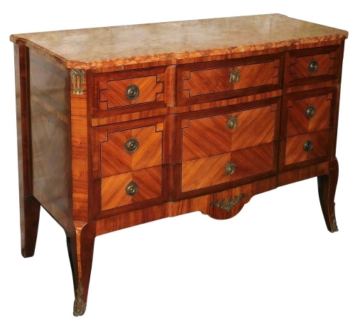 An early 20thC French kingwood break front commode, with a rectangular variegated red marble top above three long drawers each with gilt metal mounts and handles, on shaped legs with sabot feet, 87cm high, 126cm wide, 51cm deep.