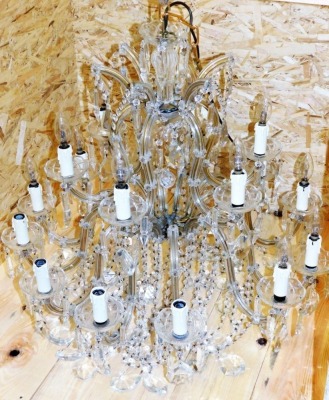 A cut glass chandelier, with rows of beads and faceted lustre drops, formed as two tiers of six and twelve arms, 79cm wide. - 2