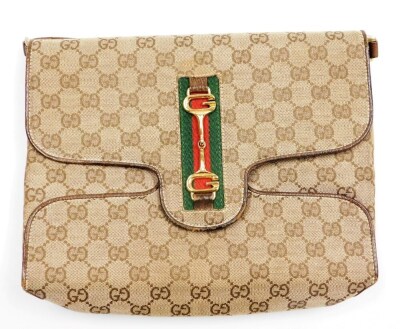 A vintage Gucci Ophidia shoulder bag, with GG monogrammed fabric, brown leather trim and handles, and GG horsebit gold coloured hardware, with a brown leather interior stamped made in Italy by Gucci, 22cm high, 27cm wide, 7cm deep, with dust bag. - 2