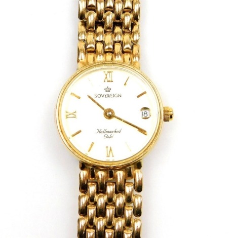 A Sovereign 9ct gold lady's wristwatch, with small circular silvered coloured dial and Roman numerals with date aperture, on a four row design bracelet, the dial 1.5cm wide, 16.6g all in, boxed.