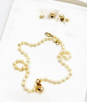 Withdrawn presale by vendor- A Classic Jewels of Hatton Garden pearl necklace and earring set, the cultured pearl necklace with a 9ct gold clasp, and clip on cultured pearl pendant with cz set drop, in gold finish but stamped 925, 46cm long, together with