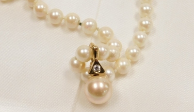 Withdrawn presale by vendor- A Classic Jewels of Hatton Garden pearl necklace and earring set, the cultured pearl necklace with a 9ct gold clasp, and clip on cultured pearl pendant with cz set drop, in gold finish but stamped 925, 46cm long, together with - 3