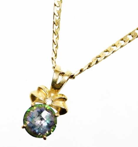 A pendant and chain, the mystic and white topaz 9ct gold pendant with makers stamp DK, formed as a bow with tiny diamond set and topaz drop, 3cm high, on a heavy curb link 9ct gold chain, 48cm long, the pendant with a Gems TV certificate, 24.7g all in.