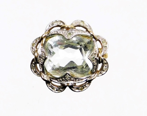 Withdrawn presale by vendor- An aquamarine and diamond set pendant, the asscher cut central aquamarine surrounded by petal detailing each set with tiny diamonds, in silver gilt coloured backing, unmarked, 2cm high, 3.1g all in.