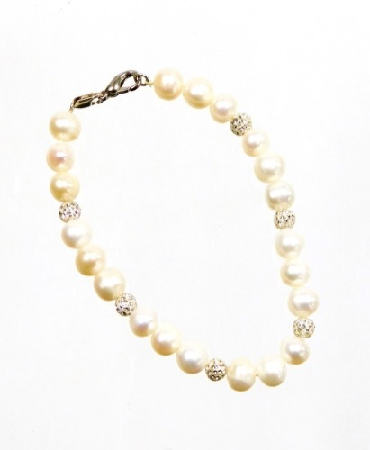 A cultured pearl bracelet, of graduated design with sparkle set bead breakers, on a string strand, with white metal clip clasp, stamped 925, 20cm long.