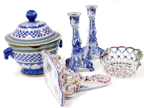 A 19thC French faience wall shelf, of scrolling rococo form, with moulded floral decoration, painted with flowers, pair of Mosamic blue and white candlesticks, floral decorated, a faience tureen and cover with dog's heads handles, and a Booths pottery che