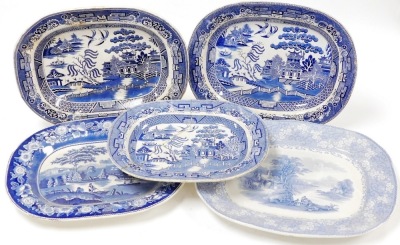 Five 19thC blue and white meat platters, comprising a platter decorated with a romantic landscape within a floral border, Nuneham Courtnay pattern meat platter and three Willow pattern meat platters.