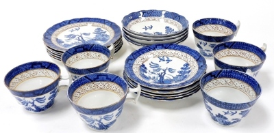 A Booths Real Old Willow pattern pottery part tea service, comprising six cups, saucers and plates, together with five fruit bowls.