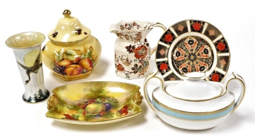 A group of pottery and porcelain, including an Aynsley Orchard Gold hexagonal jar and cover, Royal Crown Derby Imari tea plate, a sucrier and cover, and an Aynsley trumpet shaped spill vase, lustre decorated with geese. (6)