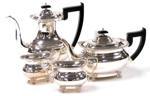 A Viners silver plated four piece tea and coffee set, with gadrooned rims, raised on four lion's paw feet, comprising teapot, coffee pot, cream jug and sugar bowl.