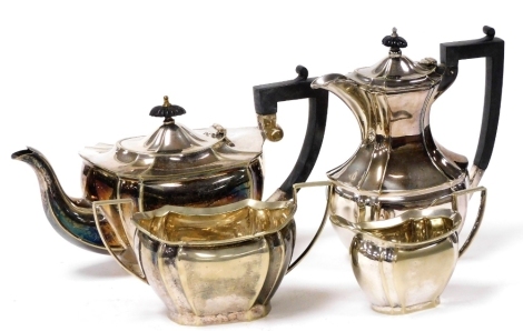 An early 20thC silver plated four piece tea and coffee set, of fluted form, comprising teapot, coffee pot, cream jug and sugar bowl.