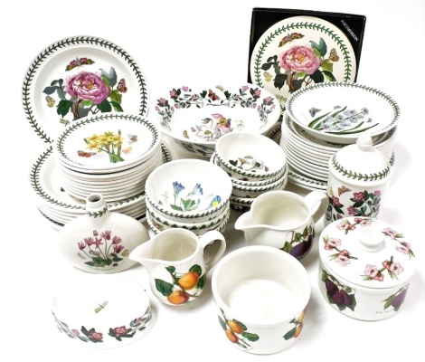 A Portmeirion pottery part dinner service decorated in the Botanic Garden pattern, some seconds, including dinner plates, soup bowls, dessert plates, together with a fruit bowl, flask, storage jars, soap dish, etc. (a quantity)