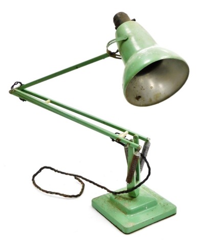 A vintage Anglepoise desk lamp, painted in green, designed by Herbert Terry.