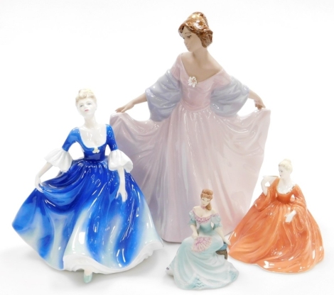 A Coalport porcelain figure modelled as The Birthday Girl, Ladies of Fashion series, together with Natalie, Beatrice, Beaumonde series, and a Nadal Spanish porcelain figure of a girl in an evening dress and shawl. (4)