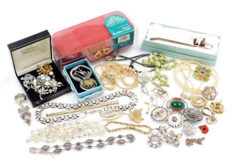 A group of costume jewellery, to include a filigree brooch, faux pearl triple strand necklace, stone set costume brooches, a W Pretorius brooch decorated with giraffes, etc. (1 box)