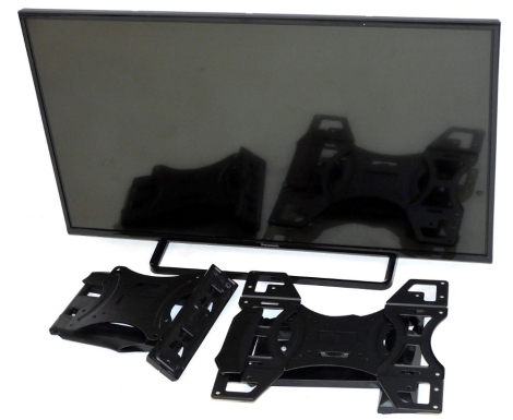 A Panasonic 42'' flat screen television, model number TX-42AS500E, with two wall mounts, lacking leads and remote.