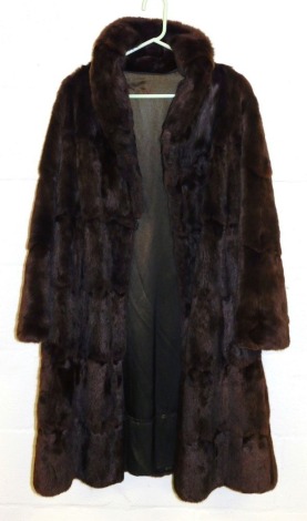 A lady's full length Coney fur coat.