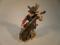 A German porcelain figure of a cello player