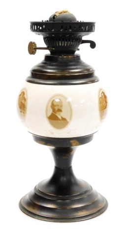 A Canada Dry ceramic and brassed metal oil lamp, printed with oval profiles of JJ Maclauglin, on a tapering base, 31cm high.