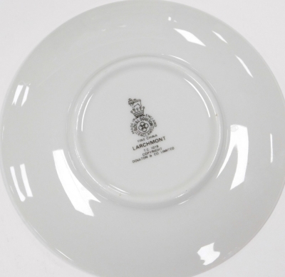 A Royal Doulton Larchmont pattern part dinner, tea and coffee service, comprising casserole dish and cover, pair of vegetable tureens and covers, meat platter, sauce boat on stand, eight dinner, dessert, soup and side plates, tea pot, bread plate, pair of - 3