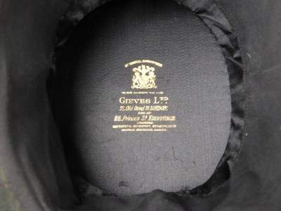 A Gieves of London black silk collapsible opera hat, another top hap stamped Dunn and Co, and a Gieves Limited bowler hat (AF). (3) - 4