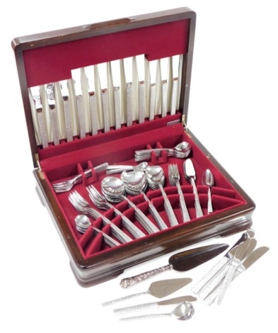 A Viners stainless steel canteen of cutlery, with textured handles, in a mahogany case.